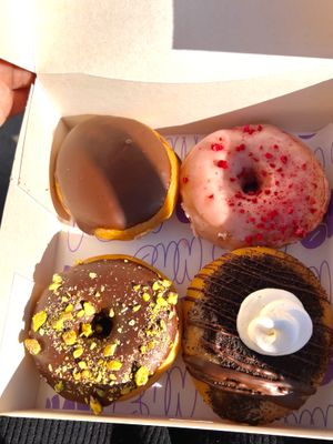 Boston Cream, Strawberry Lemonade, Chocolate Pistaccio and Chocolate Cheesecake  at Bun and Coffee in Malaga
