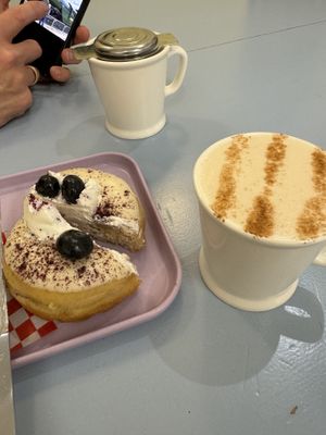 White chocolate and blueberry and chai latte with oat milk   at Bun and Coffee in Malaga