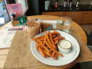 Ice chai latte 395 RSD and sweet potato fries 675 RSD at Kafeterija Niš in Nis