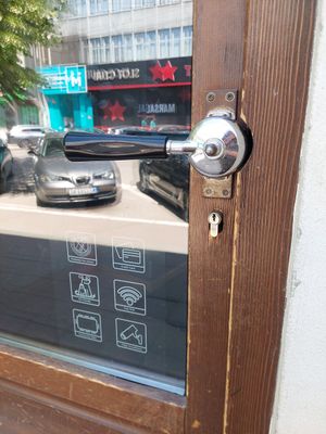 Door handle at Kafeterija Niš in Nis