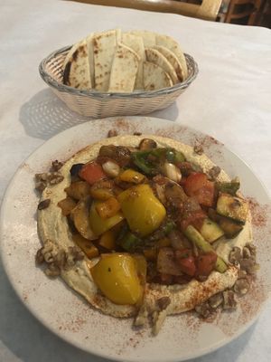 i got the Turkish Delight and enjoyed it with the complimentary pita bread and cup of white rice (not pictured). It was really good and their hummus is delicious!  at Bosphorus Istanbul Cafe in Indianapolis