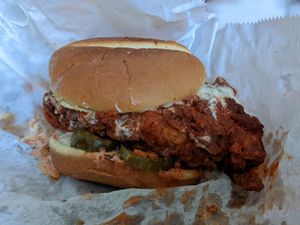 Buffalo chicken sandwich so big it's 2 servings. at NuVegan in Baltimore