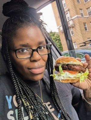Vegan Crab cake sandwich with NuVegan sauce lettuce tomato and a Very soft bun at NuVegan in Baltimore