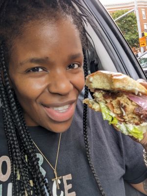 Vegan Crab cake sandwich with NuVegan sauce lettuce tomato and a Very soft bun at NuVegan in Baltimore