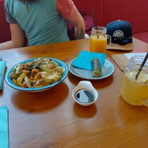 Poke bowl and sushi roll with homemade lemonade and orange juice. at Green Planet the Foodcourt in Gran Canaria