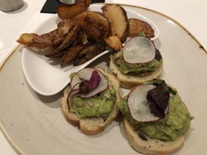 Avocado Toast w/ Onion Jam & Breakfast Potatoes at Walt Disney World - Steakhouse 71 in Lake Buena Vista