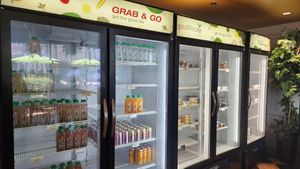Grab & Go section for frozen meals, juice and dessert. at Good Life Cafe in Columbia
