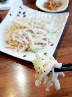 enoki mushroom salad - spicy mustard sauce!!! at Seongwon Uyukmyeon - 성원우육면 in Seoul