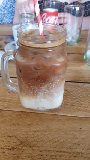 Iced coffee made with soya milk and vanilla syrup shot at Bella Rose Cafe in Scarborough