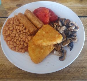 Vegan breakfast - Vegan sausage, beans, plum tomatoes, mushrooms and hash browns at Bella Rose Cafe in Scarborough