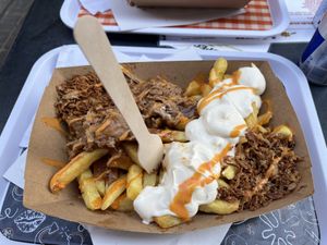Great vegan options. Portion Medium fries with the special is enormous but great!   at Frituur Arré Patat in Antwerpen