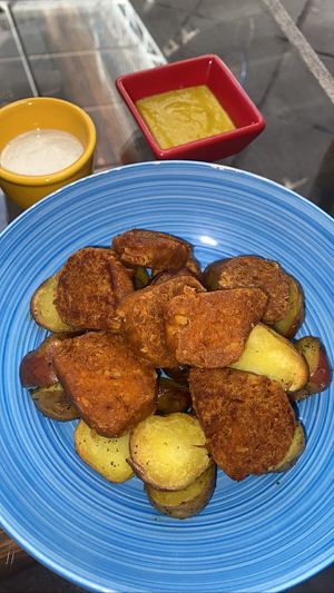 Hot dogs and potatoes (loved the veg meat more than the Andean potatoes )  at Parada Vegana in Cusco
