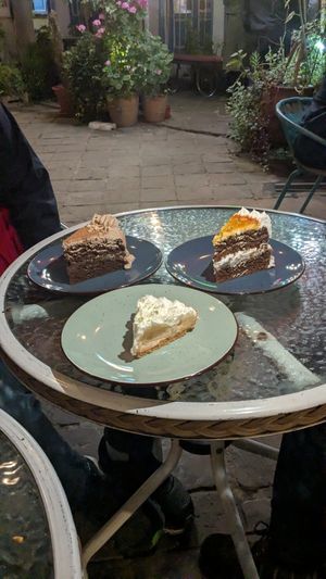 Chocolate cake, orange and chocolate cake, lemon pie at Parada Vegana in Cusco