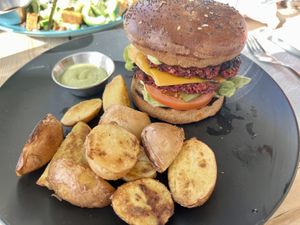 Vegan burger with potatoes   at Teapot Cafe in Taghazout