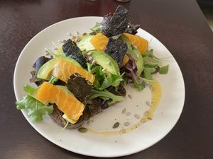 Salmon sashimi avocado toast  at Comércio Café Coworking in Porto