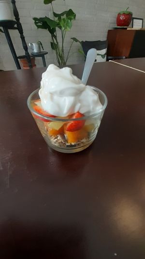 Fruit bowl with coconut yogurt at Comércio Café Coworking in Porto