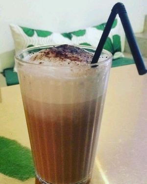 vegan caffe latte at Comércio Café Coworking in Porto