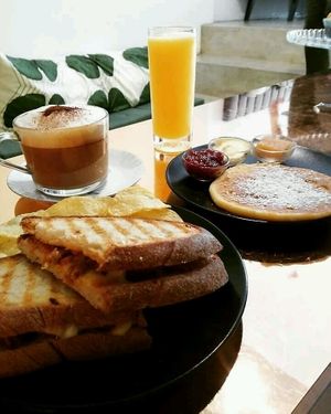 all vegan (ham, cheese, pancake, butter and cappucino) at Comércio Café Coworking in Porto