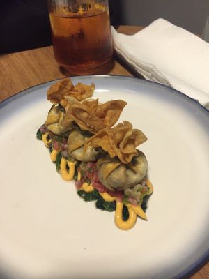 Pastel recheado com cogumelos e castanha de caju. Explosão de sabores e texturas. at Kitsune in Curitiba