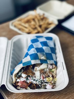 Gyro with seitan and a side of fries  at Vegan On The Fly in New York City