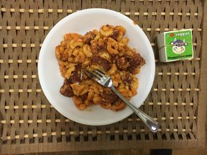 Mac & cheez with wings, plated at home at Vegan On The Fly in New York City