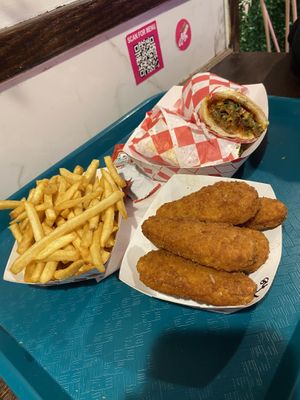 Fries, beyond chicken tenders, steak sandwich  at Vegan On The Fly in New York City