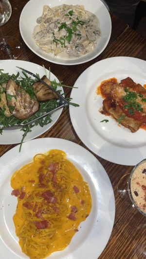 Carbonara, lasagna, truffle pappardelle, eggplant salad  at Funghi E Tartufo in Melbourne