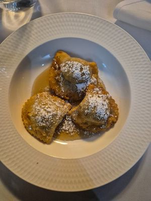 Caggionetti abbruzzesi $18 EXXY: 3 fried ravioli w/chocolate paste (dry sawdusty texture)+chickpeas on orange infused vincotto (tasted of maple syrup-the only flavour of the dish) at Funghi E Tartufo in Melbourne
