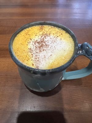 Golden Milk: Ginger, turmeric, cinnamon, pepper, coconut oil, honey, apple cider vinegar, oat milk  at Hartwood in Tulum