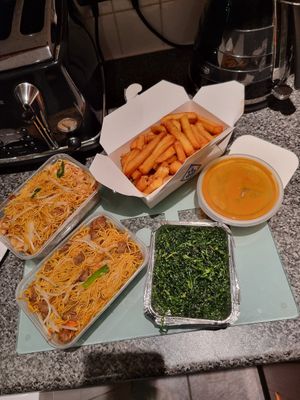 A duck and a chicken chow mein, crispy seaweed, salt and pepper chips, satay sauce at Vegan Green Kitchen in Manchester