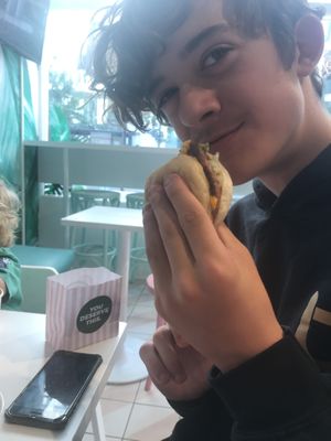 Liam tucking in  at Neat - Victoria in South West London