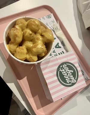 Tater tots & smash burger  at Neat - Victoria in South West London