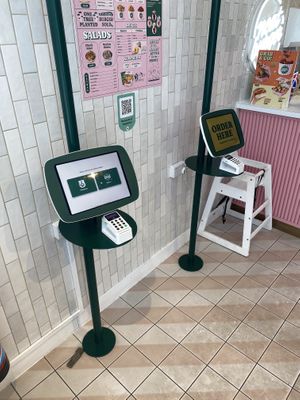 Ordering screens  at Neat - Victoria in South West London