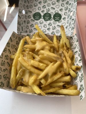 Skinny fries with  added cheesy sauce  at Neat - Victoria in South West London