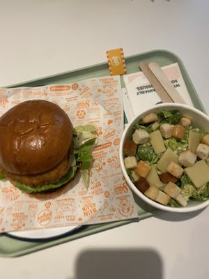 Chicken burger and Caesar salad   at Neat - Victoria in South West London