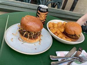 Veggie crunch burger with spicy tater tots  at Neat - Victoria in South West London