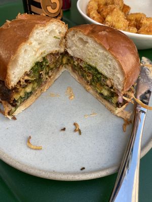 Inside the veggie crunch burger  at Neat - Victoria in South West London