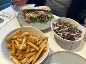 Grilled chick’s & basil pesto, seasoned fries and slaw  at Neat - Victoria in South West London