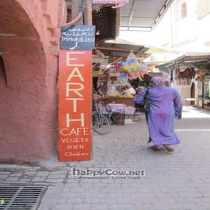 all signs lead to Earth Cafe at Earth Cafe - Derb Nakouss in Marrakech