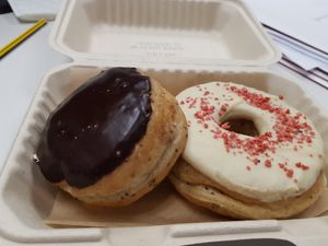 Boston cream and white chocolate doughnuts at Areca Bakery in Barcelona