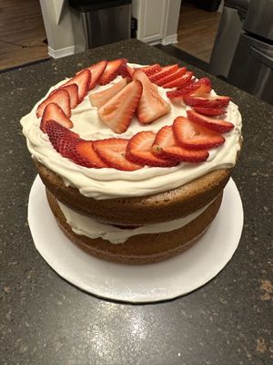 Custom cake made. Vanilla cake with custard, whipped cream, and strawberries    at Keepin it Vegan  in Ottawa