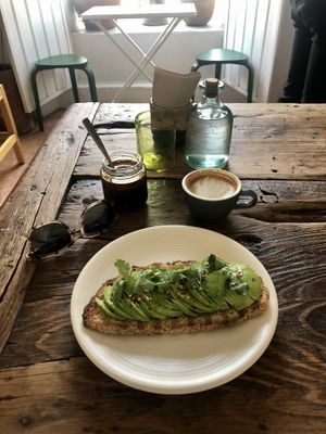 Vegan avocado tostada and coco flat white 💚  at Yegolé Termopolio in Oaxaca