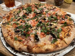 Pizza with vegan mozzarella   at Padre Island Brewing Co in South Padre Island