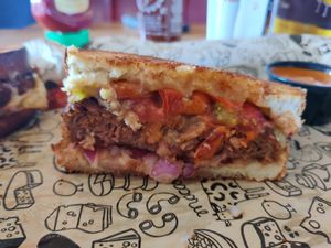 Signature grilled cheese - vegan melt (has Beyond Burger patty) at I Heart Mac & Cheese in Deer Park