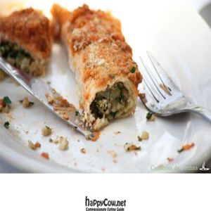 Pancake style dough made with fresh almond milk, filled with spinach & ''cashew cotta'' topped with tomato & basil sauce. at Mi Vida Cafe in Miami