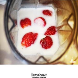 Fresh home made almond milk and strawberries. at Mi Vida Cafe in Miami