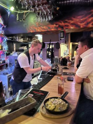 Sitting up at the bar   at Fire Cafe in Osaka