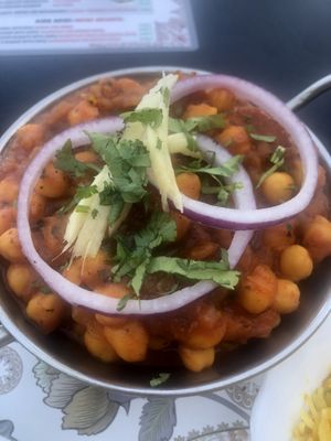 Chick peas cooked with onion, tomato and herbs    at Happy Flavors in Fuengirola