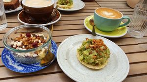 Chia pudding with granola and arepa with avocado. at Léandrés in Paris