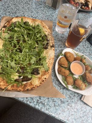 Vegan Rocket Flatbread & vegan fried artichoke hearts with Sriracha ranch.   at Hearth & Tap Co in Montvale